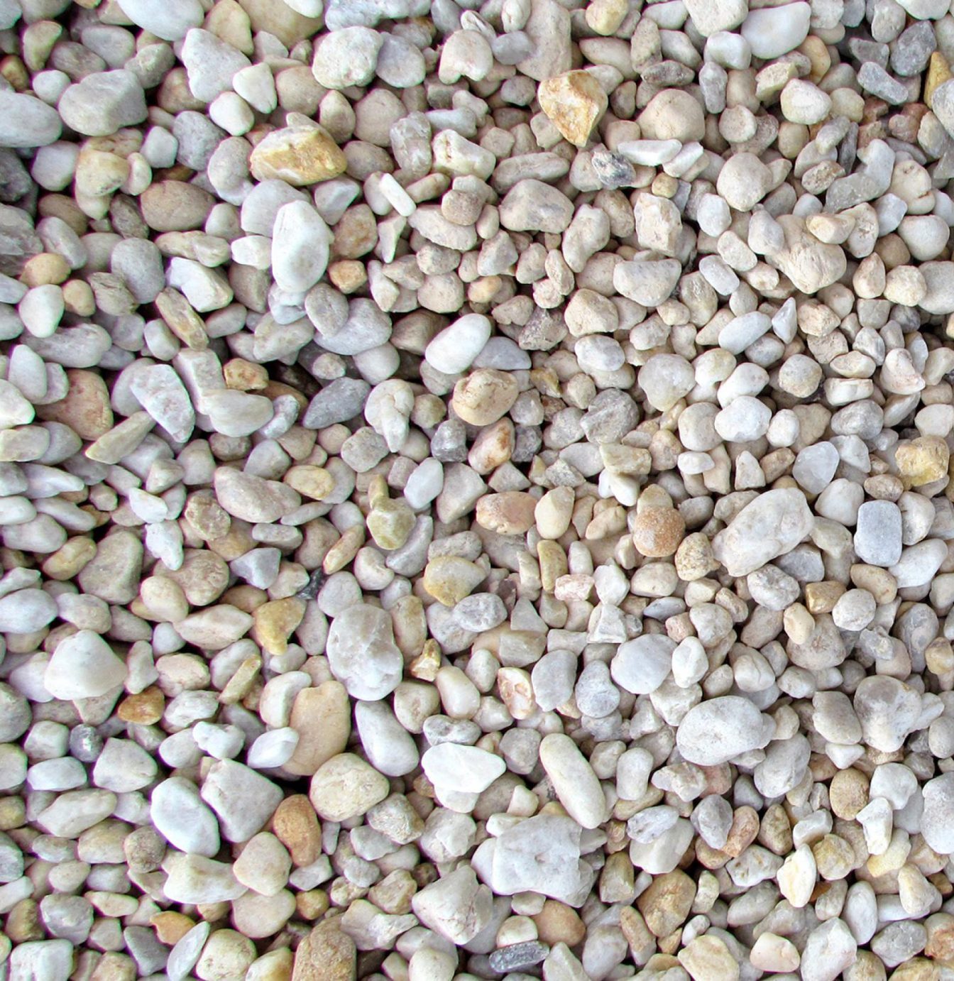 close up of pearl round pebbles in a pile.