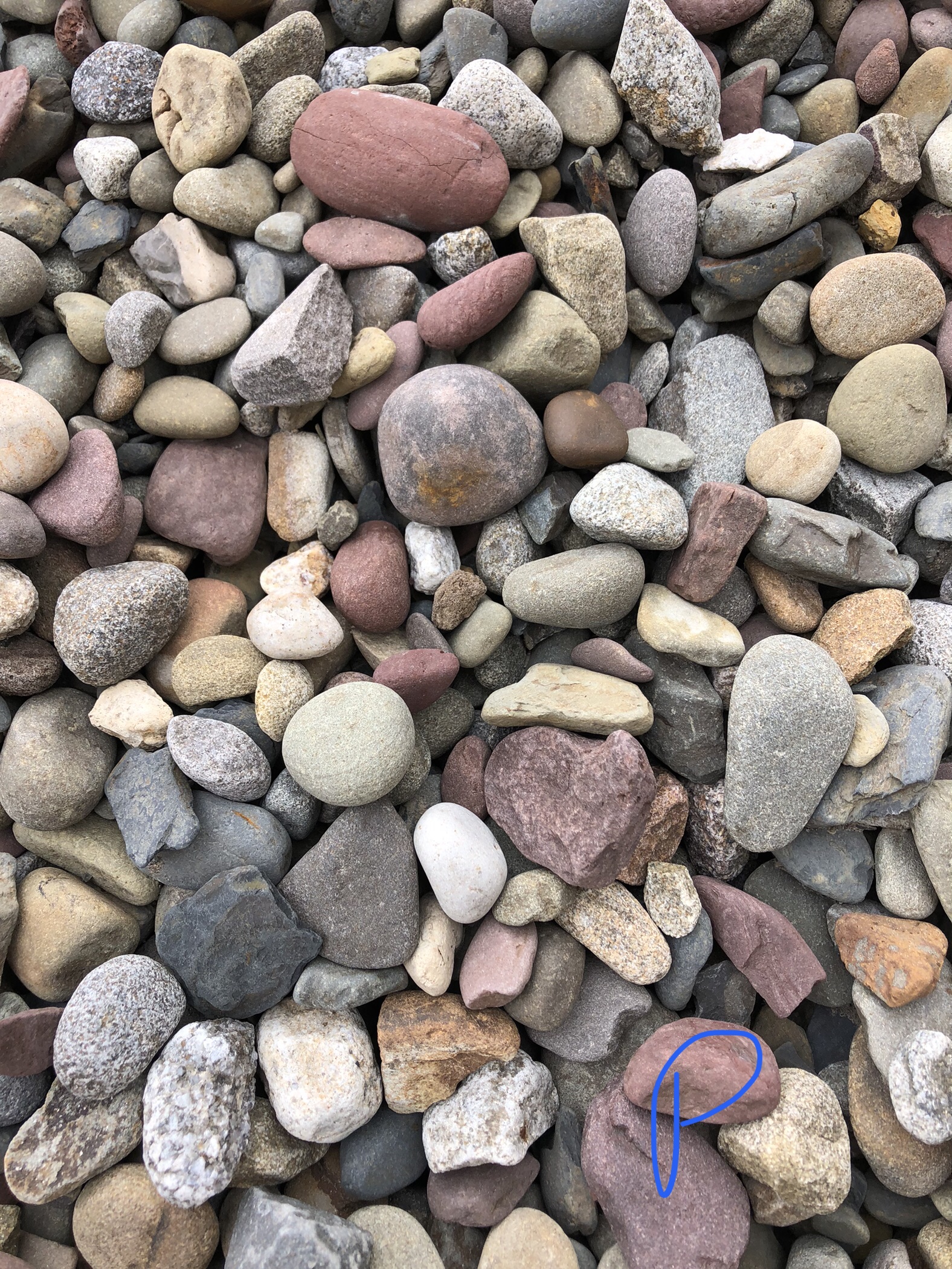 pile of various color pebbles called pocono stones.